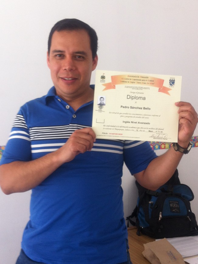 Pedro with Diploma